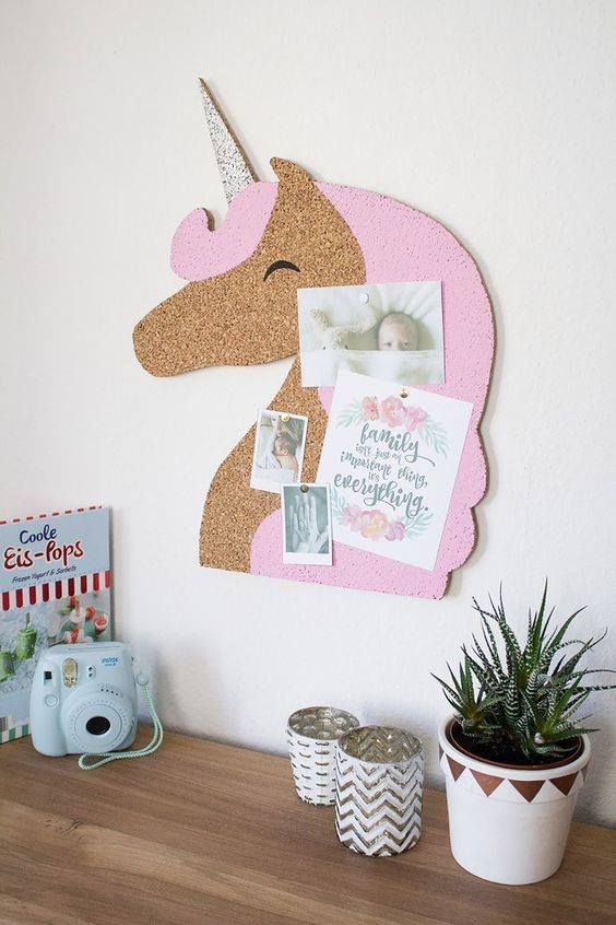 a creative cork pinboard shaped as a unicorn is great for kids' spaces