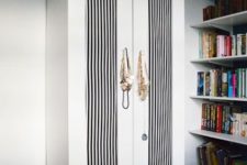 06 Aneboda wardrobe with black and white striped doors for an elegant feel