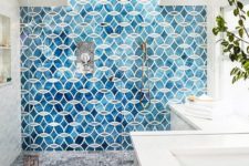 06 make your bathroom more interesting with bold blue mosaic tiles on one wall