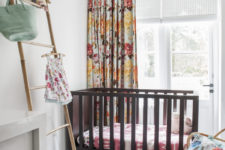 07 The kid’s space is done with floral textiles, a striped rug and looks very lively and colorful – exactly what a small girl needs