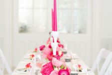 07 a black and white table setting with pink and hot pink florals and candles