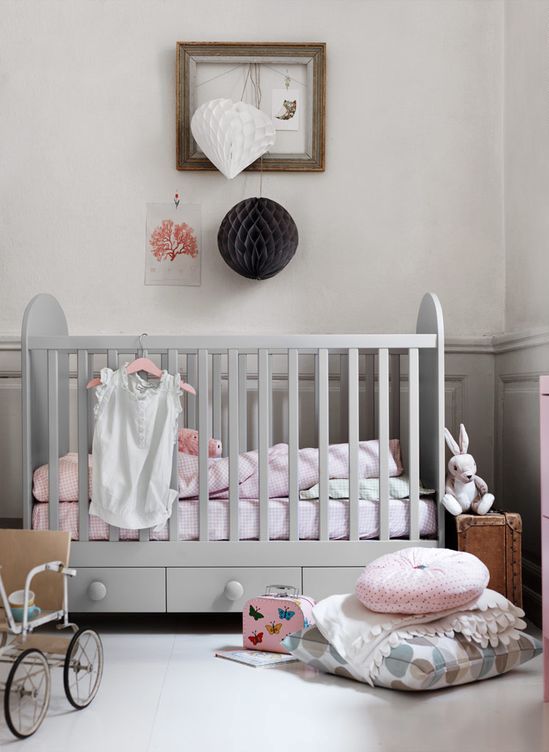 A grey IKEA Gonatt cot is ideal for a peaceful nursery done in neutrals