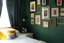 07 an eclectic gallery wall with artworks and empty frames for a bold look