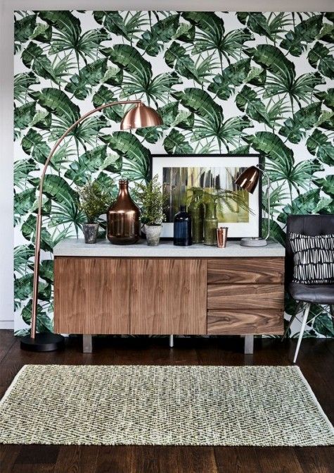 a tropical print wallpaper wall is a classic and bold solution for any living room