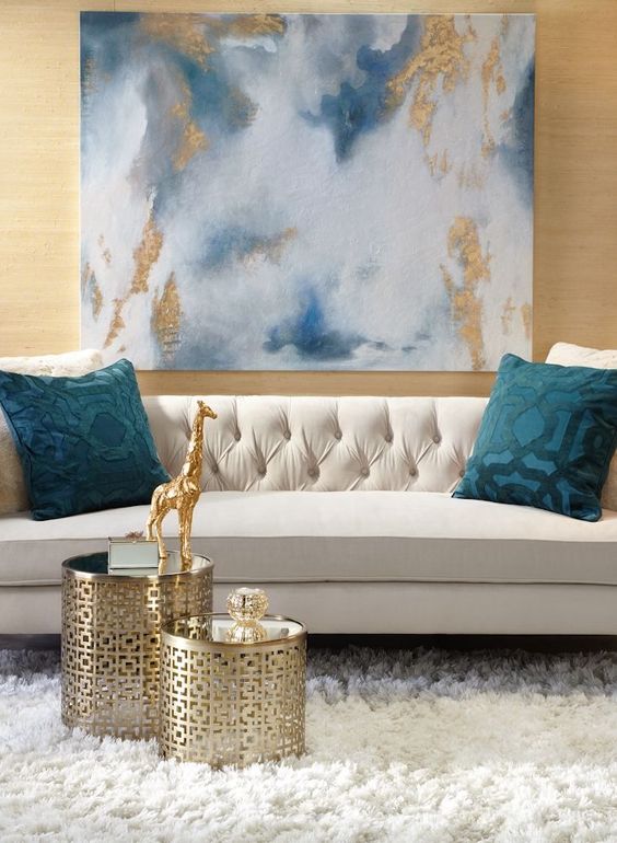 an abstract artwork with gold leaf is a great addition for a glam interior