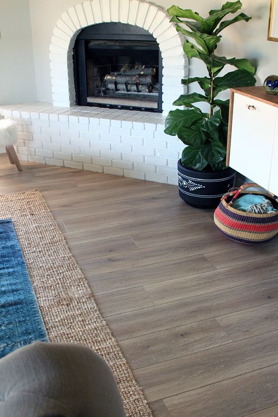 laminate is a great option for a living or dining room as it's easy to maintain and is stain resistant