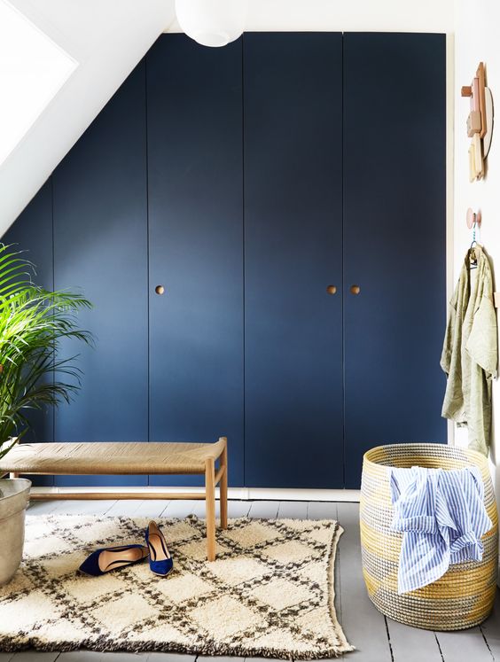 very chic Pax hack for an attic space, with a smokey blue shade and natural oak handles