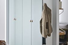 11 IKEA Pax hack in a muted green shade and with tiny leather pulls is very stylish