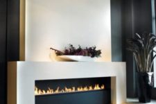 11 an ultra-modern ethanol fireplace in black and white will be a refined feature