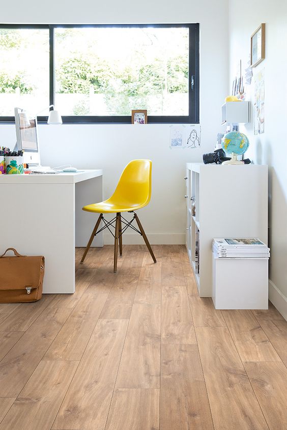 oak-colored laminate is a cool solution for a home office where you move chairs often - it won't scratch that much