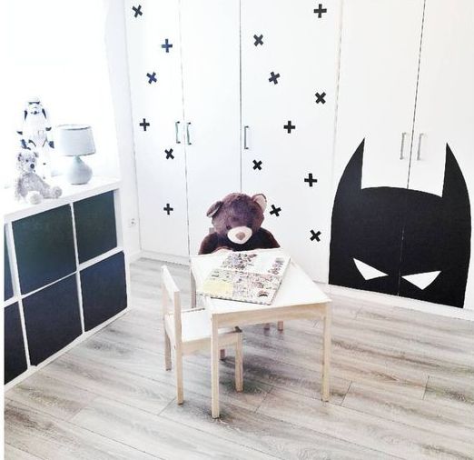 a Dombas wardrobe stenciled with black crosses to fit a Scandinavian kid's room