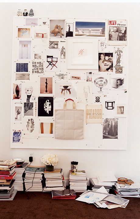 a framed pinboard upholstered with some fabric is a great idea for any space