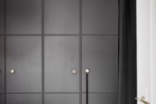 14 graphite grey paneled doors with small knobs for a Pax wardrobe