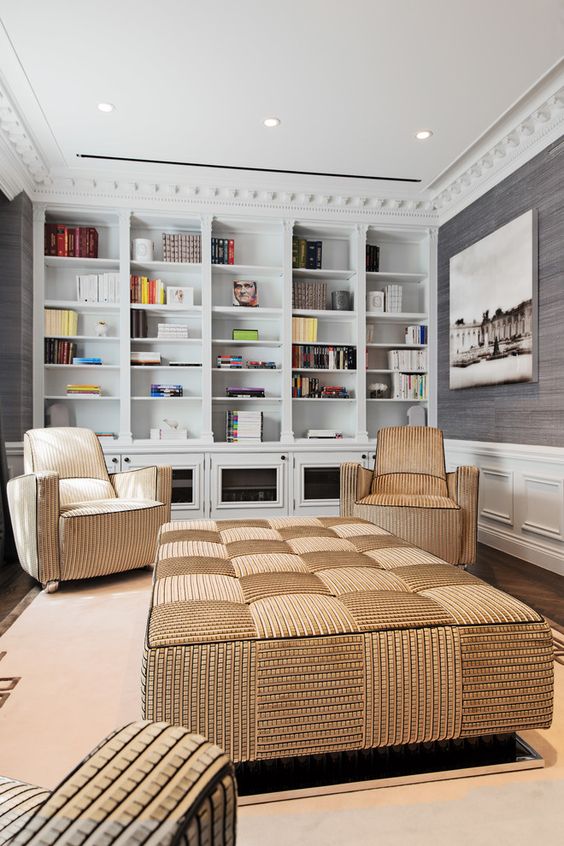 an oversized upholstered checked ottoman and matching chairs for the reading zone
