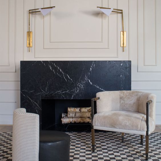 black marble brings a refined feel to the space and prevents the top from heating