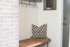 15 brign an industrial feel to your space with a hairpin leg and leather bench in the corner