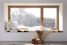 16 enjoy the views lying on a cool and comfy windowsill covered with faux fur