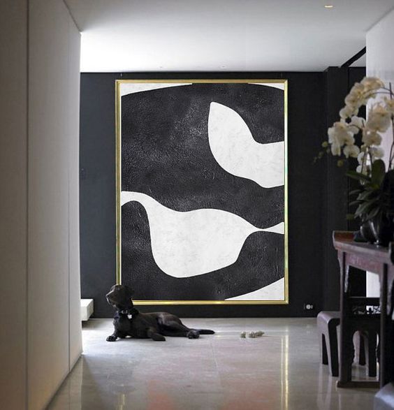 an oversized abstract wall art will make your entryway super chic and refined