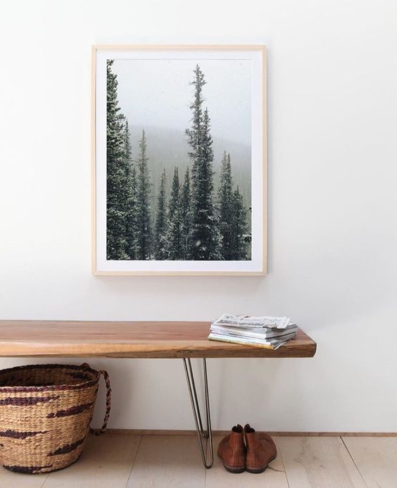 a beautiful artwork adds a natural feel to this entryway and catches an eye