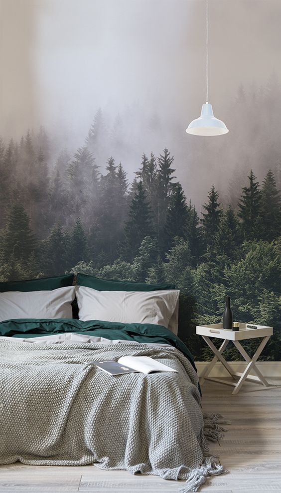 a realistic forest wall mural makes a statement in this space and looks relaxing