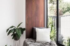 19 a windowsill covered with dark stained wood is a great seat or daybed