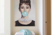 19 why not hang a glam and fun artwork in a girlish entryway