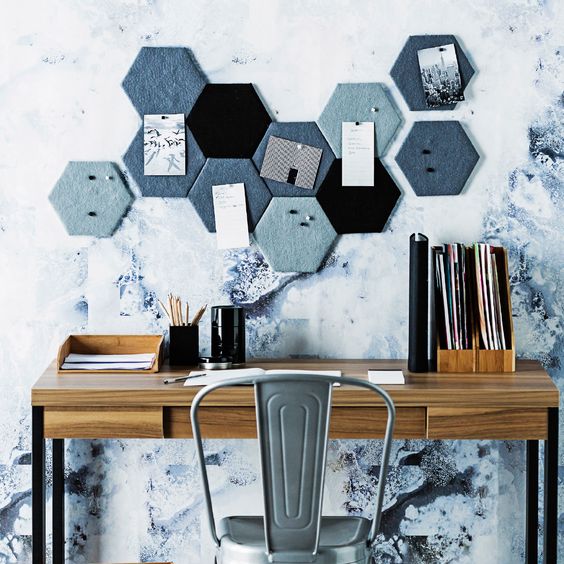 fabric covered hexagons create a cool geometric pinboard and work as decor