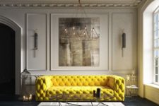 21 a super bold yellow tufted sofa makes a cool statement in a neutral space