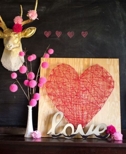 a string art red heart sign for a bold modern look