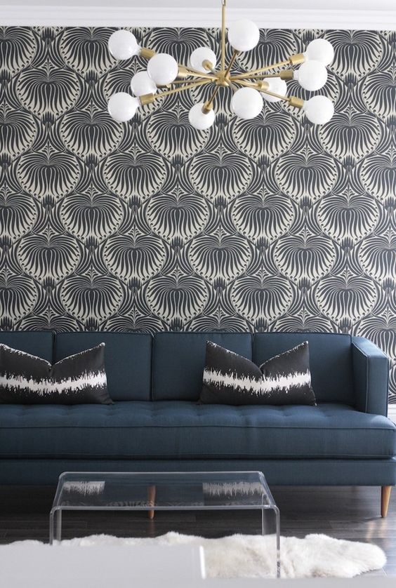 a stylish wallpaper accent wall for a mid-century modern styled room