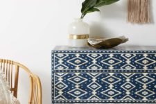 24 a patterned inlayed dresser is an amazing idea for a boho chic space