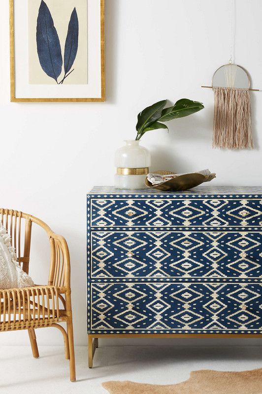 a patterned inlayed dresser is an amazing idea for a boho chic space