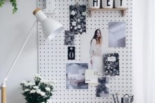 27 a pegboard is an ideal pinboard and you may attach shelves and other stuff to it