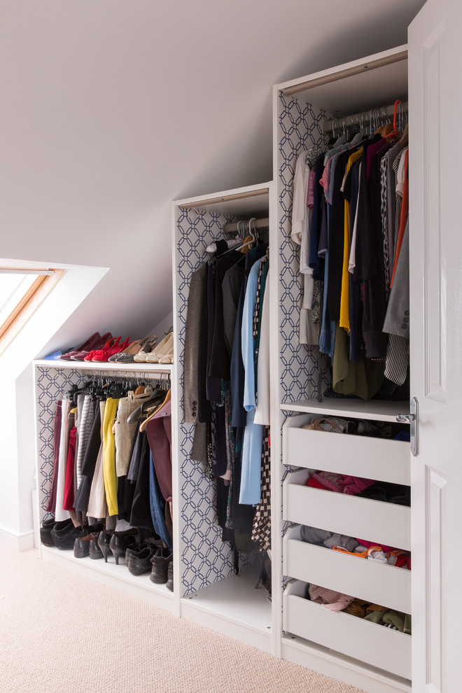 Adding wallpaper inside the wardrobes hides fitting holes and make them look stylish.