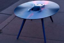 01 Bold Ford GT table features a vehicle that seems to be appearing from liquid metal in the center of the table