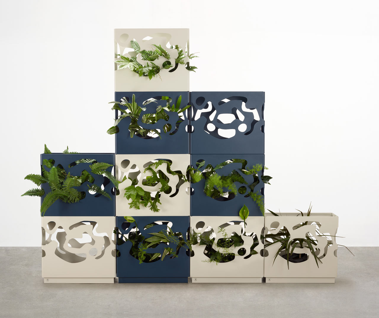 These stylish modern planters are inspired by topographical patterns of one famous architect