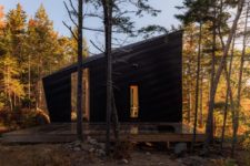 01 This angular forest cabin was designed as a weekend retreat for a couple with two kids