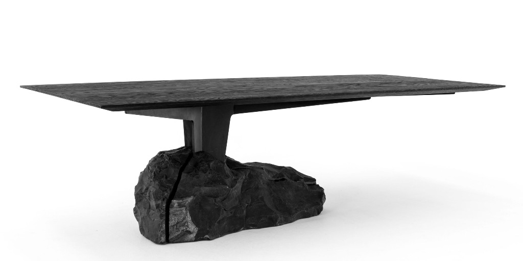 The ccollection features Humo dining table with a piece of marble as a base