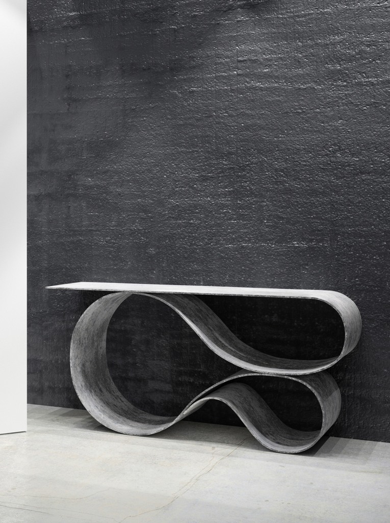 The console has an amazing fluid shape that is usually not associated with heavy concrete