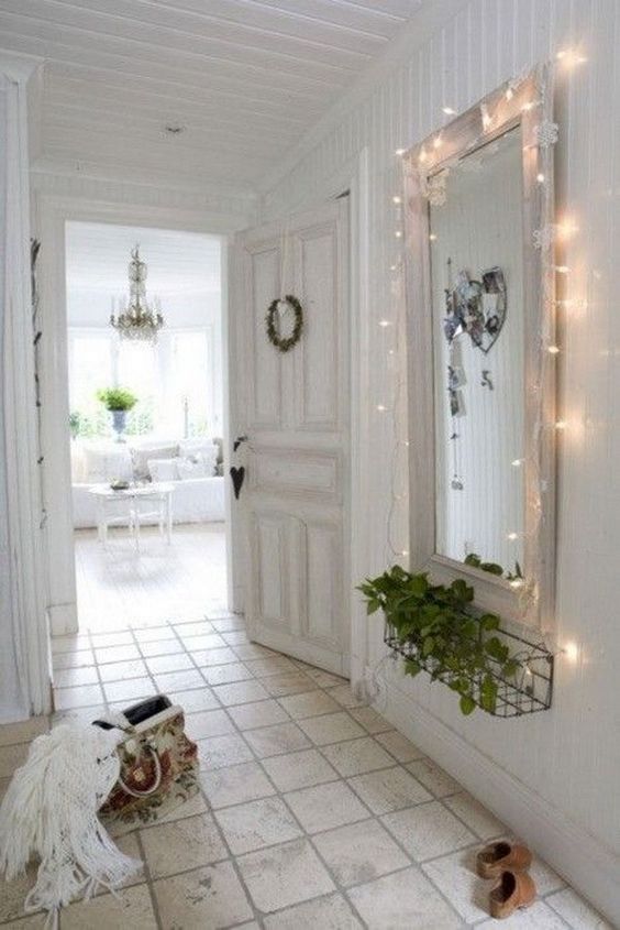 cover the mirror with string lights to accent it and make the space more amazing