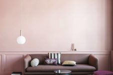 03 a chic pastel space with a blank pink wall that makes the space balanced