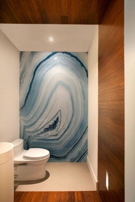 bold blue agate wallpaper can be used to accentuate a boring wall in your bathroom