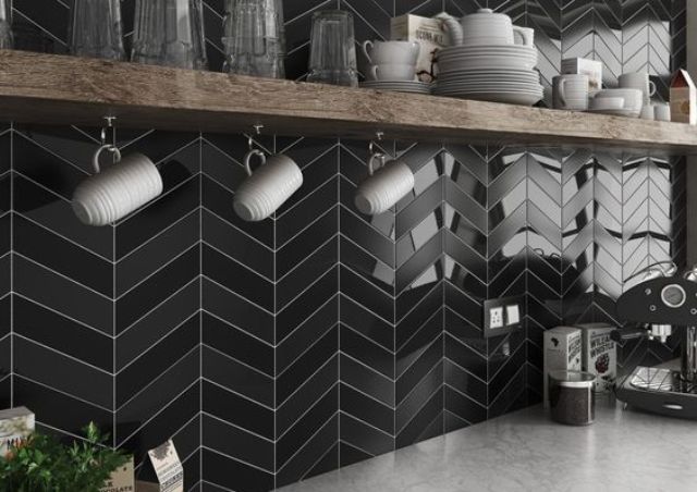 elegant matte and glossy black chevron tiles with white grout look wow