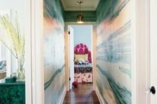 04 make a long and boring corridor bold and chic with green agate wallpaper and brass touches