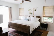 05 I love the wooden bed and floral hangings over it, vintage rugs and Roman shades bring that tropical and boho feel