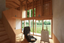 06 There’s much light-colored wood, pendant lamps and large windows that overlook the wood or garden