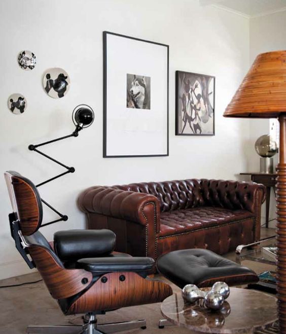 a masculine space with a brown leather sofa that defines the whole space