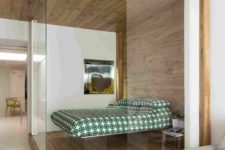 06 a small glass covered bedroom with acrylic furniture for a contemporary feel
