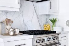 07 a cool sleek marble backsplash for an eye-catchy touch in a white kitchen