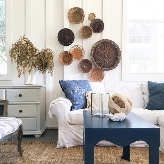 a seaside space spruced up with a basket collection on the wall
